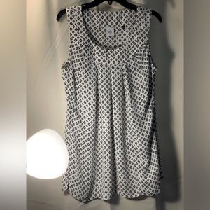 Cabi gently loved. In new condition. Size large. Cream with blue/gold design